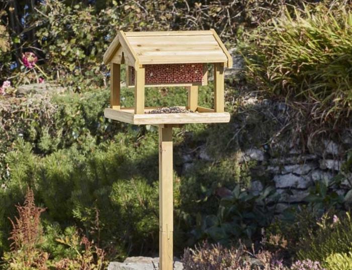 Nature's Market Premium Bird Table with Built-in Feeder in a sunny garden