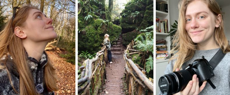 A female photographer and nature lover hiking outdoors in the woods and posing with her camera
